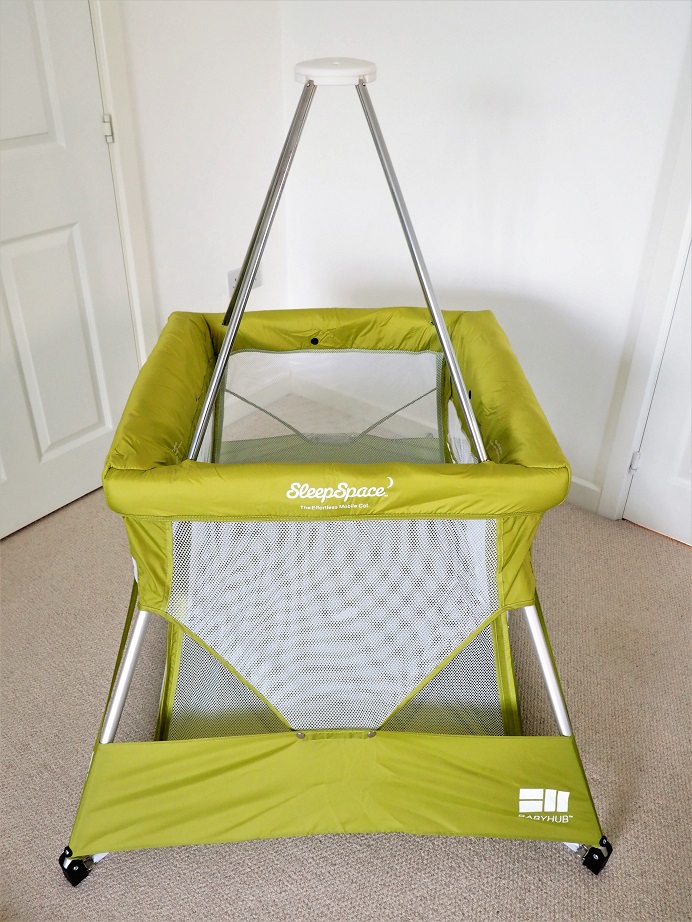 The 2018 Sleepspace in ruby red BabyHub Travel Cot 
