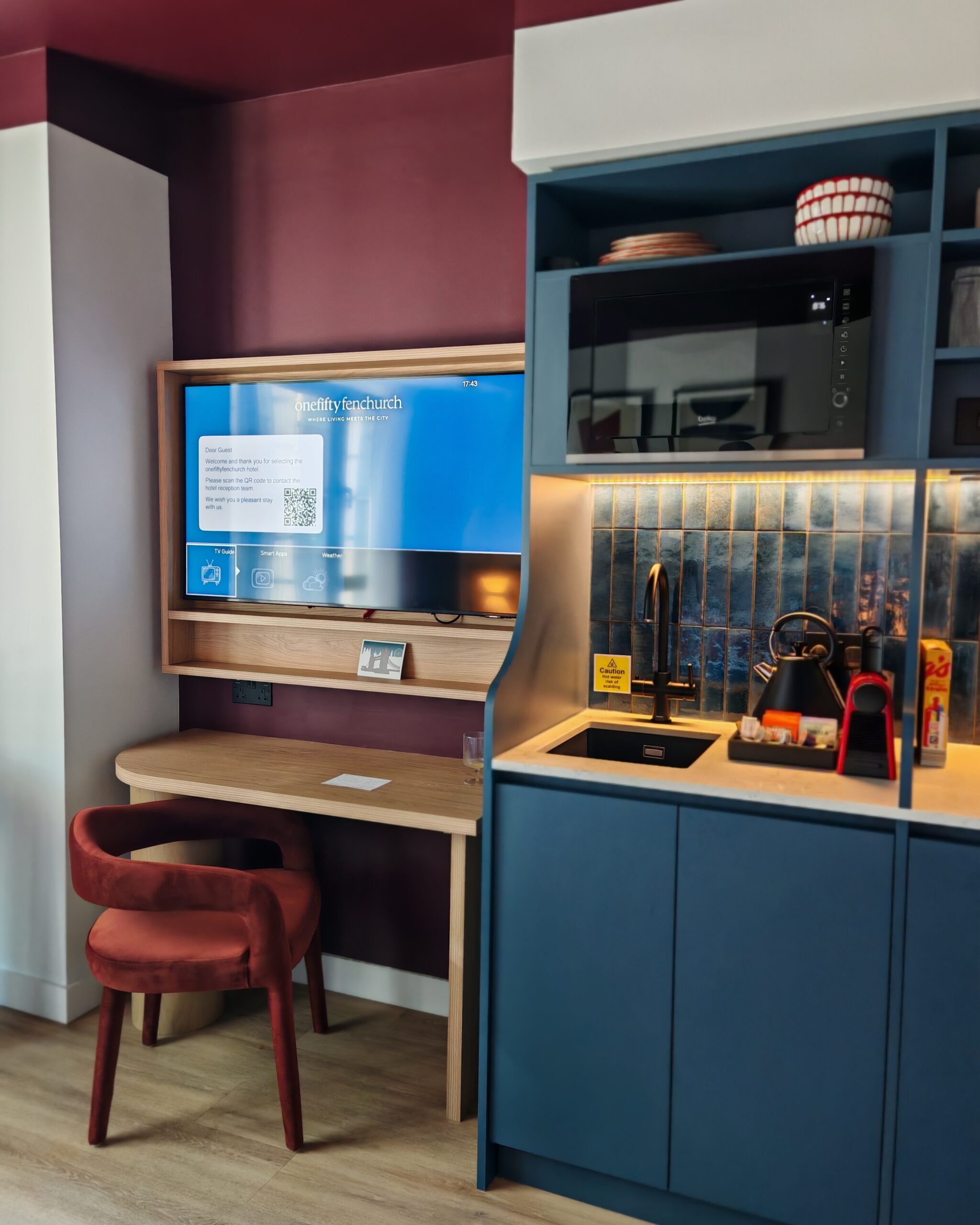 Kitchenette area in one studio at onefifty fenchurch with a sink and a tap, as well as a workspace with a TV screen Kitchenette area in one studio at onefifty fenchurch with a sink and a tap, as well as a workspace with a TV screen