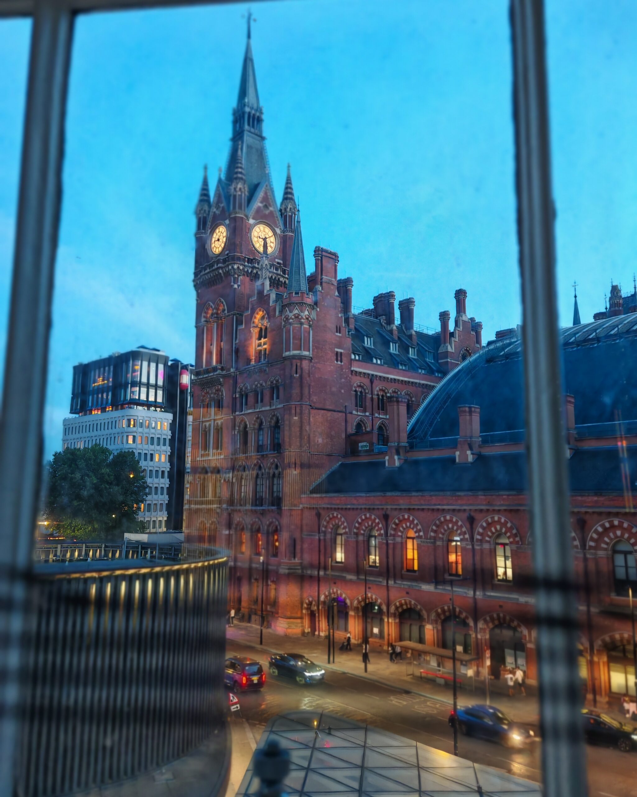 View of St Pancras International and the St Pancras Hotel by night from a window at the Rails restaurant