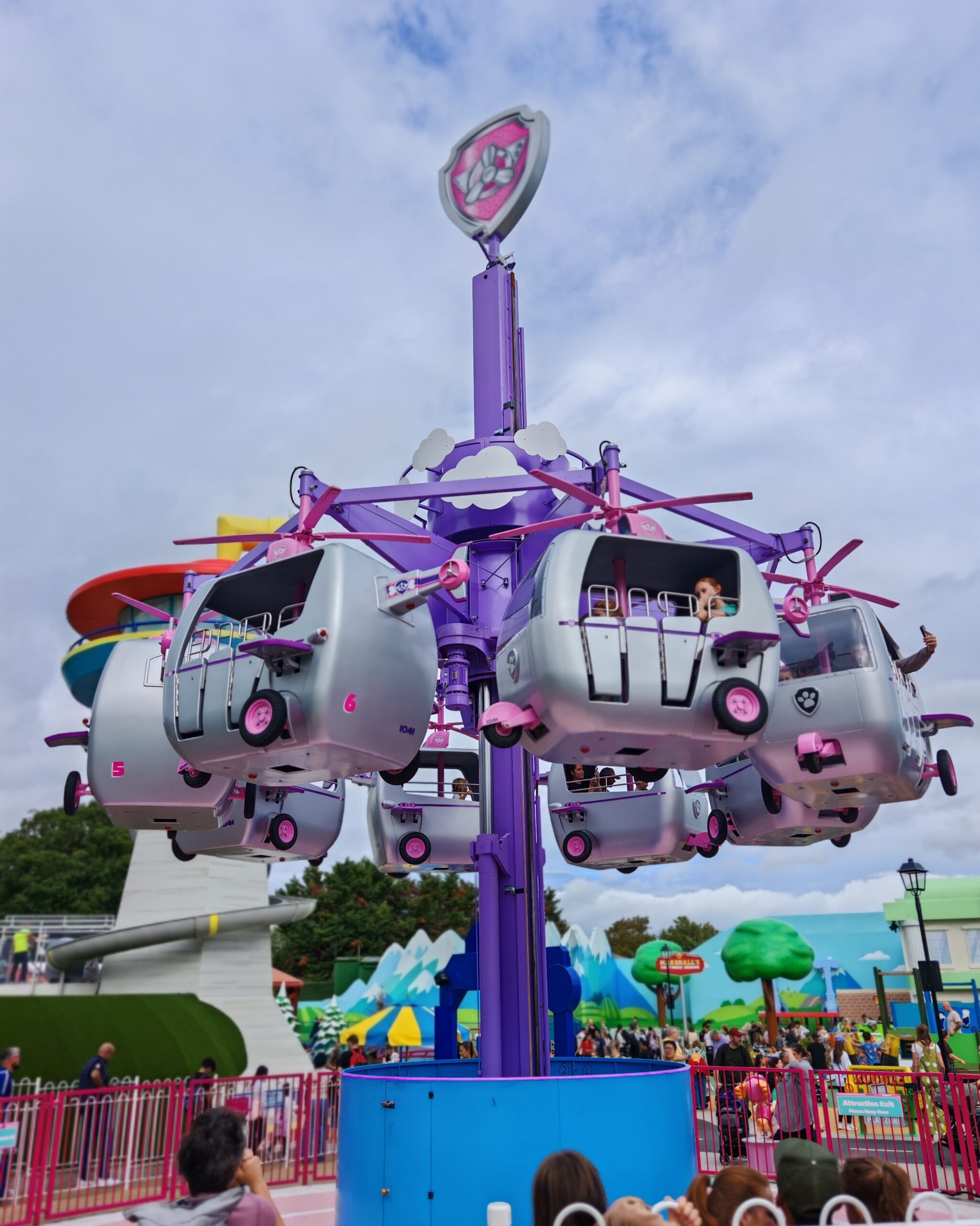 Sky ride, which is made of purple helicopters with pink wheels, at Chessington World of adventures in Surrey Sky ride, which is made of purple helicopters with pink wheels, at Chessington World of adventures in Surrey