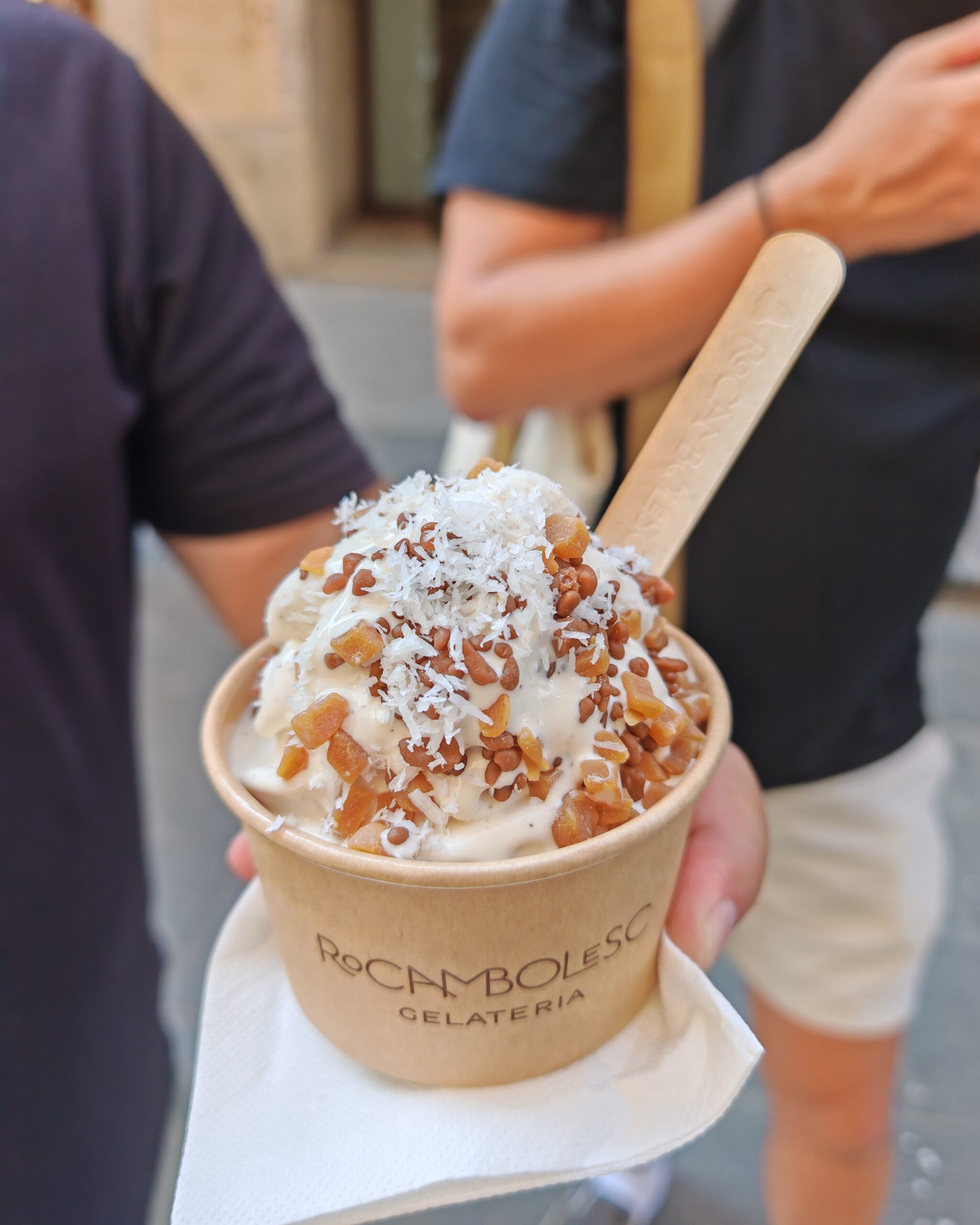 ice cream with nuts and coconut sprinkles from rocambolesc Gelateria in Girona, Spain ice cream with nuts and coconut sprinkles from rocambolesc Gelateria in Girona, Spain